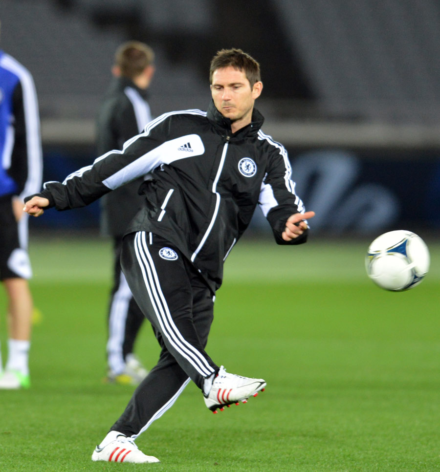 Frank Lampard hits a volley during a Chelsea training session