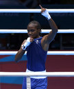 Nicola Adams raises her hand after defeating India's Chungneijang Mery Kom Hmangte, London 2012, ExCel, London, August 8, 2012