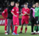 Liverpool look dejected after losing to Sao Paulo