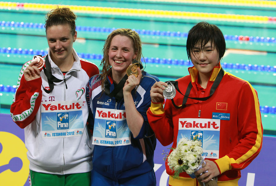 Hannah Miley of Great Britain, centre, Shiwen Ye of China ,right, and Katinka Hosszu of Hungary after the women's 400 meters individual medley final