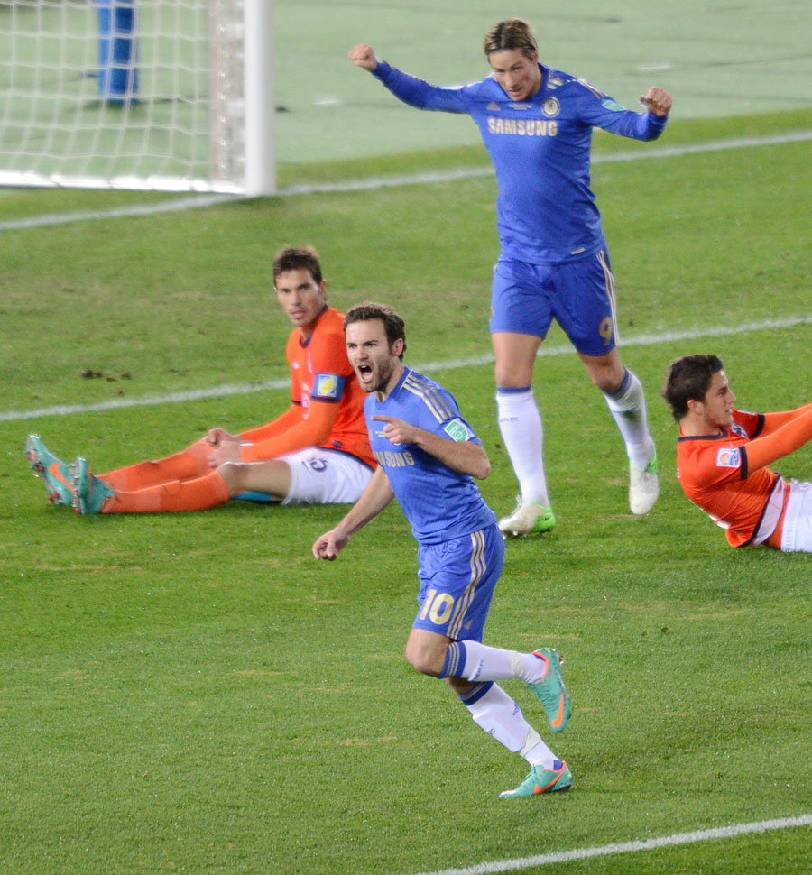 Juan Mata and Fernando Torres celebrate