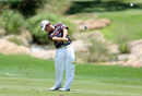 Louis Oosthuizen clips a shot away from the fairway
