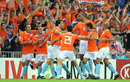 Holland's Ruud van Nistelrooy celebrates with his team-mates after scoring the first goal