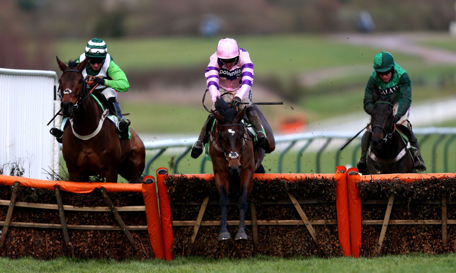 Zarkandar ridden by Ruby Walsh jumps the last ahead of Rock On Ruby (left) and Grandouet