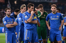 Chelsea players look on glumly