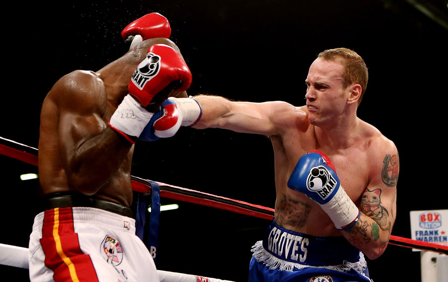 George Groves lays in to Glen Johnson during their bout
