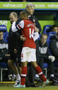 Theo Walcott hugs Arsene Wenger