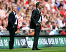Sir Alex Ferguson and Jose Mourinho stand on the touchline