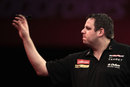 Adrian Lewis stands on the oche