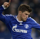 Schalke's Klaas-Jan Huntelaar takes the ball down 