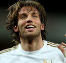 Swansea City's Miguel Michu celebrates scoring his side's first goal against Arsenal