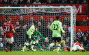 Jonny Evans steers the ball into his own net