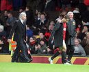Sir Alex Ferguson puts his arm around Javier Hernandez as Alan Pardew trudges off
