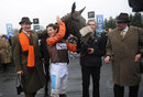 Owner Robert Waley-Cohen, jockey Sam Waley-Cohen and trainer Nicky Henderson in the winners enclosure with Long Run