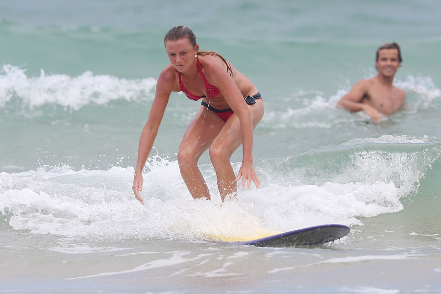 Daniela Hantuchova has a surfing lesson from Julian Wilson