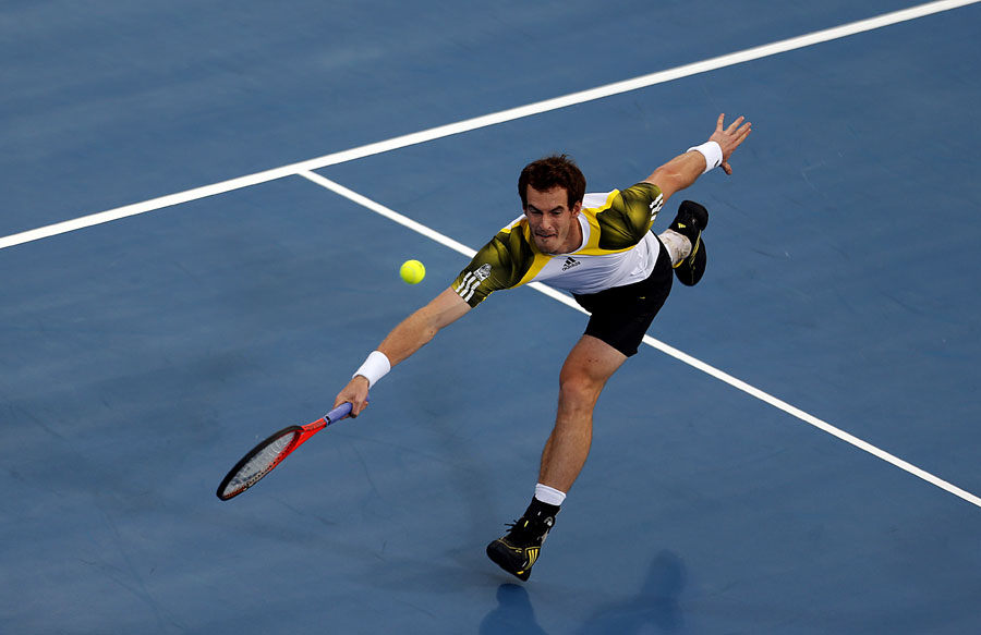 Andy Murray stretches for the ball