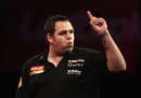 Adrian Lewis celebrates during his win against Kevin Painter
