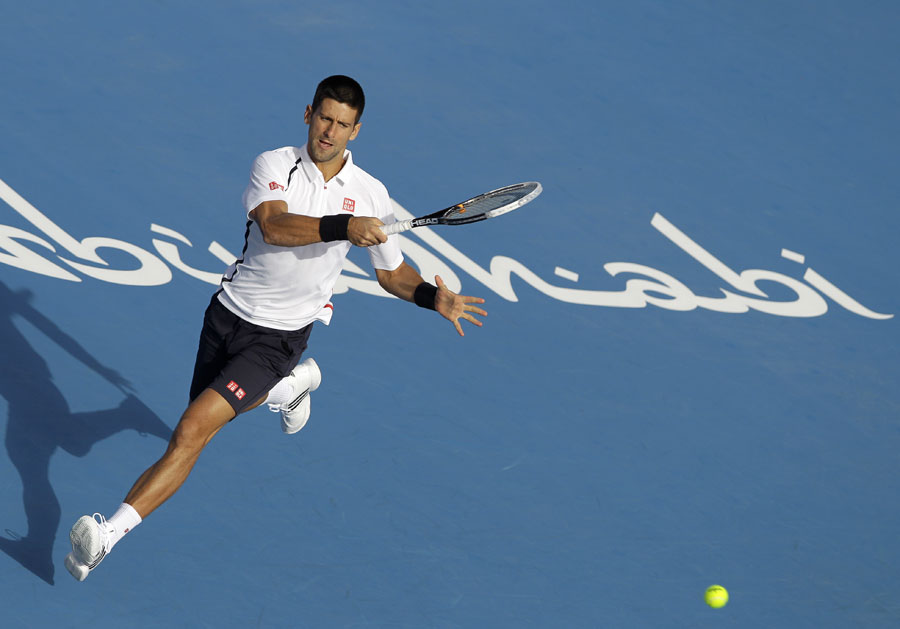 Novak Djokovic strides into a forehand