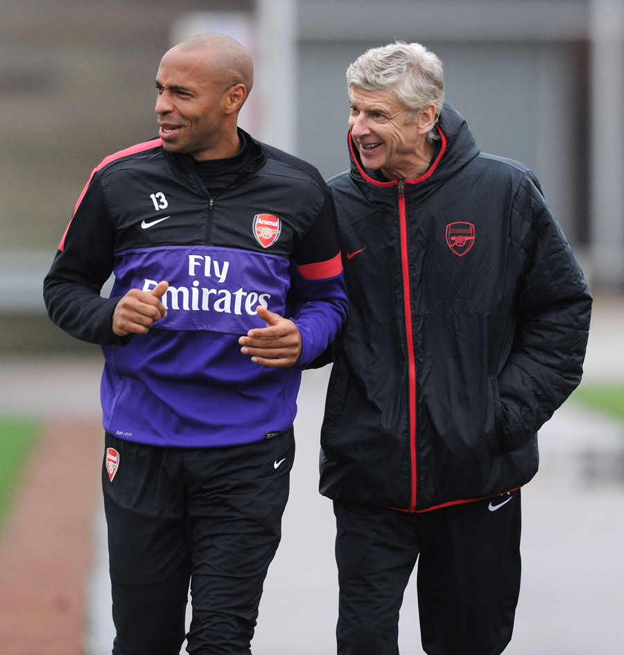 Thierry Henry and Arsene Wenger share a joke