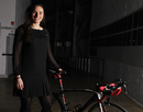 Dame Sarah Storey poses with her bike