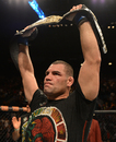 Cain Velasquez lifts the UFC heavyweight belt