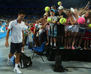Novak Djokovic winces in pain
