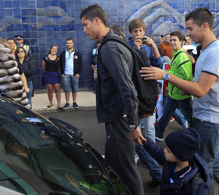 Cristiano Ronaldo and his girlfriend Irina Shayk arrive at Madeira airport