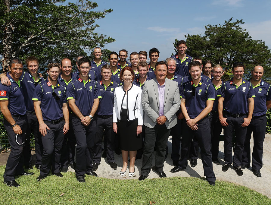 Australian Prime Minister Julia Gillard poses with the Australian Test team