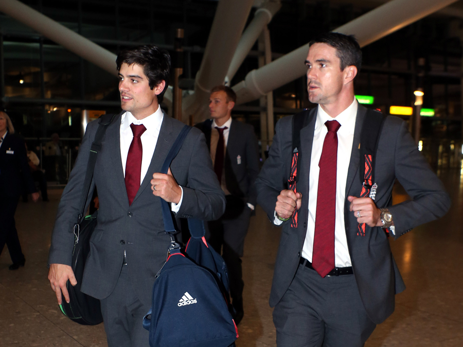 Alastair Cook and Kevin Pietersen prepare to catch their flight