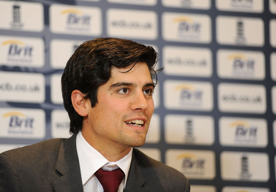 Alastair Cook speaks to the press before flying back to India