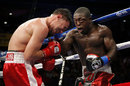 Robert Guerrero, left, takes a punch from Andre Berto in the 10th round
