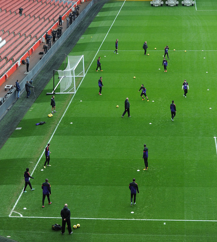 Arsenal players take part in a training session