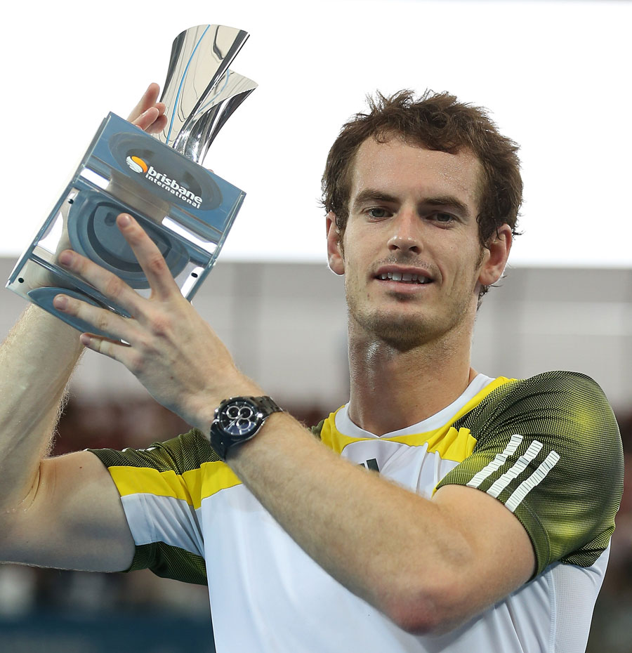 Andy Murray holds the trophy