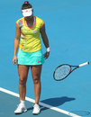 Laura Robson throws her racket after losing a point