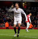 Miguel Michu celebrates scoring his side's first goal