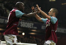 Joe Cole is congratulated by his team-mates
