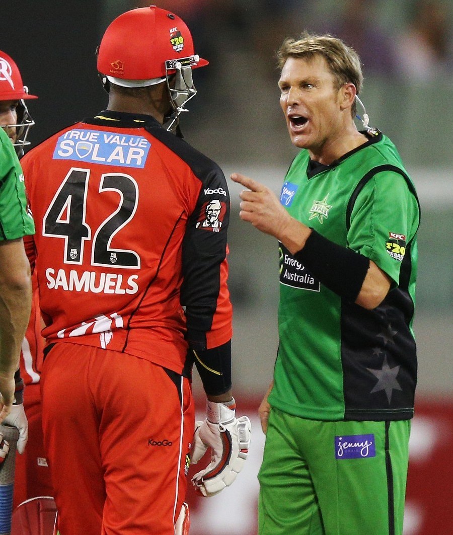 A miked-up Shane Warne remonstrates with Marlon Samuels