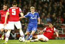 Lewis Holtby evades Francois Coquelin
