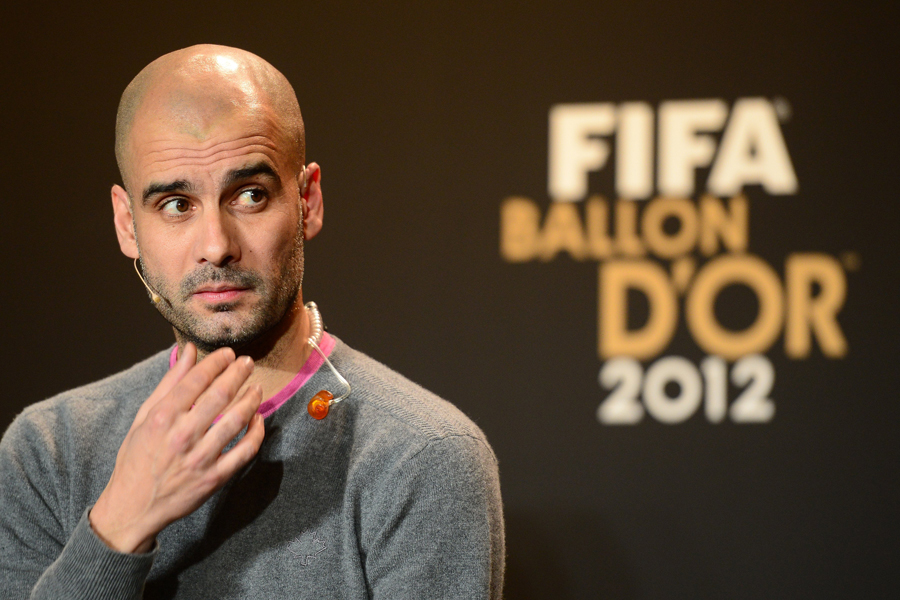 Pep Guardiola speaks at a press event