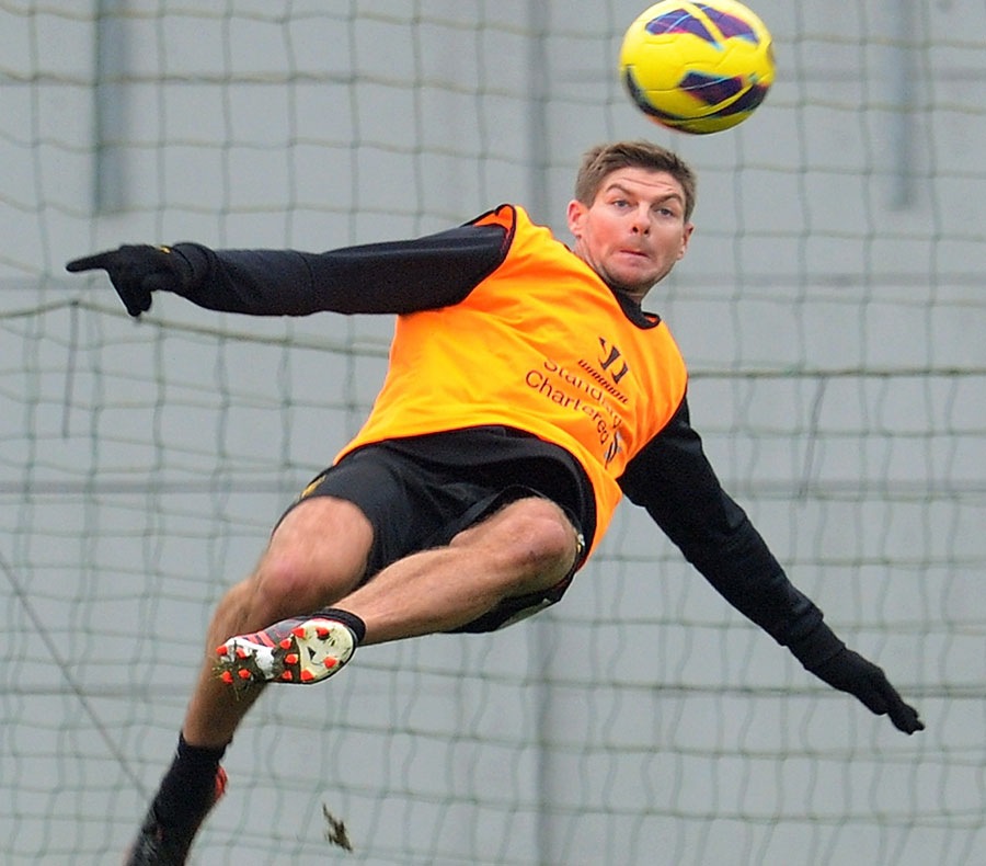 Steven Gerrard tries a spectacular effort during a training session