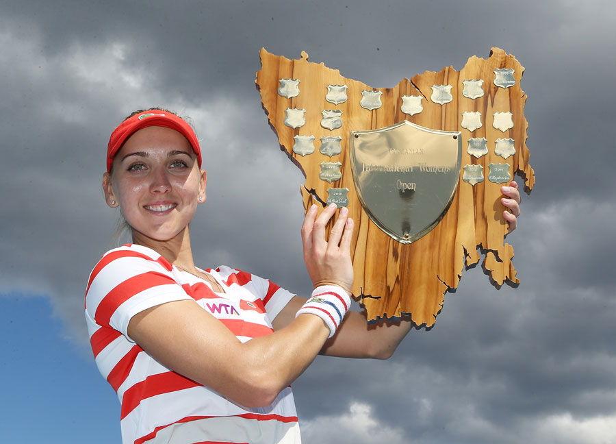 Elena Vesnina parades her new trophy
