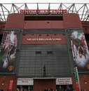 A bronze statue of Sir Alex Ferguson stands outside the Sir Alex Ferguson Stand 