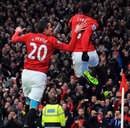 Patrice Evra and Robin van Persie celebrate United's second goal