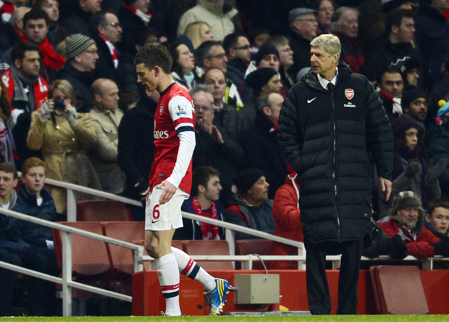 Laurent Koscielny heads down the tunnel after being sent off