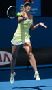 Maria Sharapova powers into a forehand