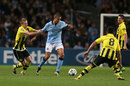 Jack Rodwell is tugged back by Marco Reus
