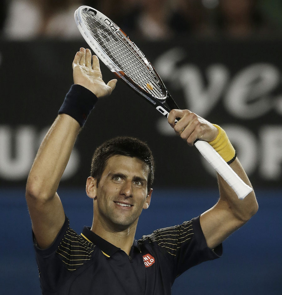 Novak Djokovic celebrates victory over Ryan Harrison
