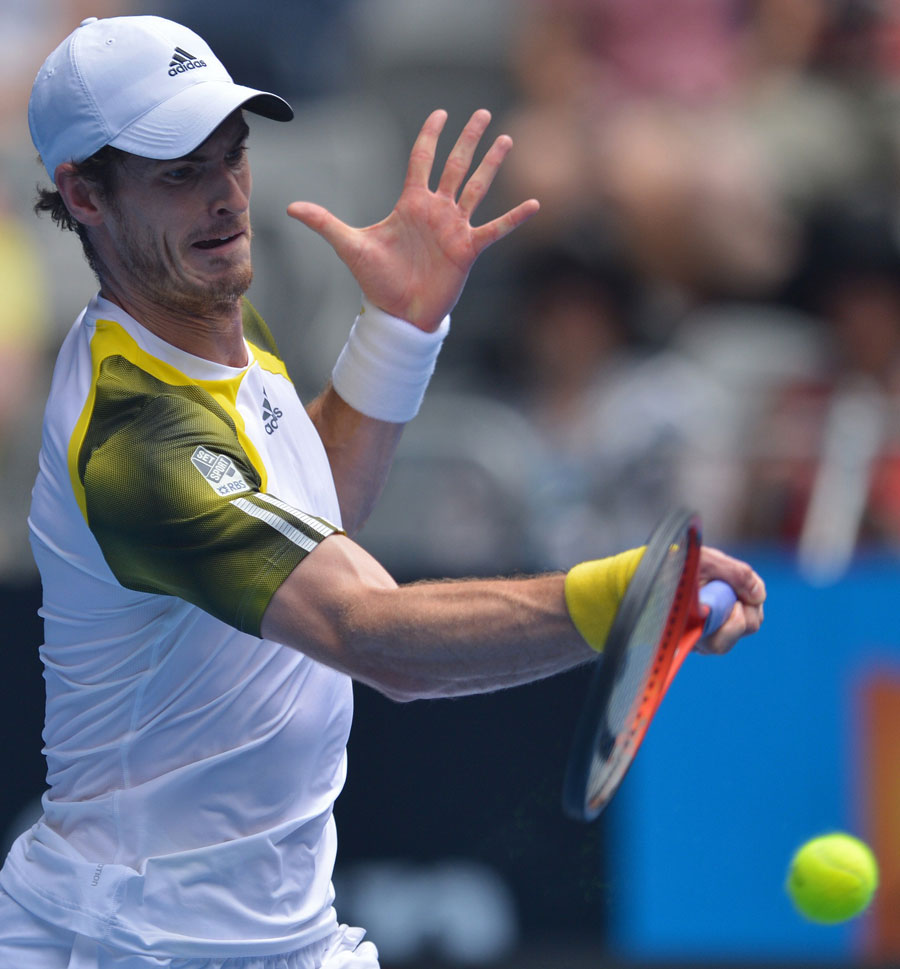 Andy Murray climbs into a forehand