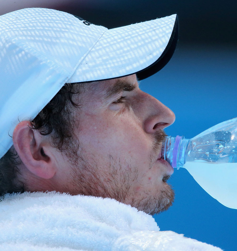 Andy Murray takes a drink