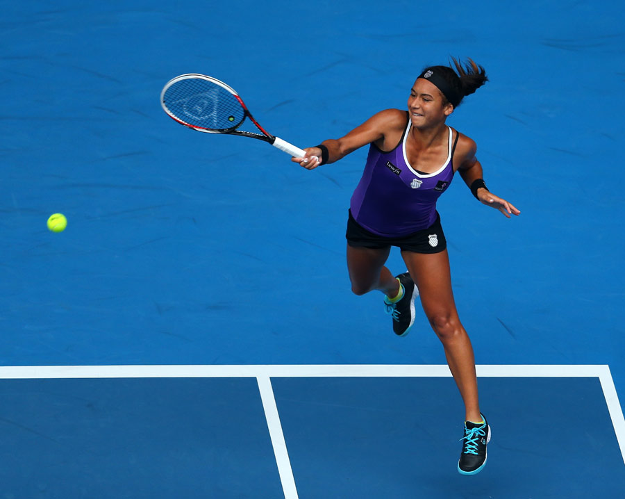 Heather Watson powers into a forehand